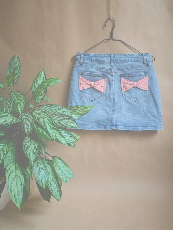 Tracktr Other - Girls size 16 denim skirt pink bow 🎀 pockets